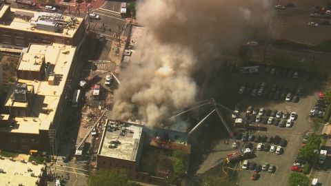 Firefighters respond to the gas blast in Durham on Wednesday morning.