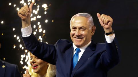 Netanyahu waves to his supporters in Tel Aviv, Israel.