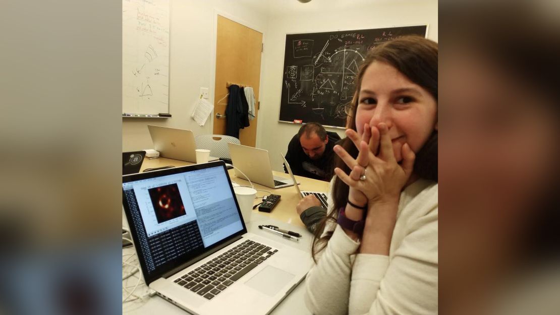 Katie Bouman with the fully-rendered black hole image.
