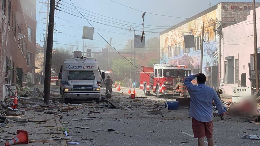 The aftermath of an explosion in downtown Durham, NC. CNN has blurred a figure at bottom-right due to a graphic injury.