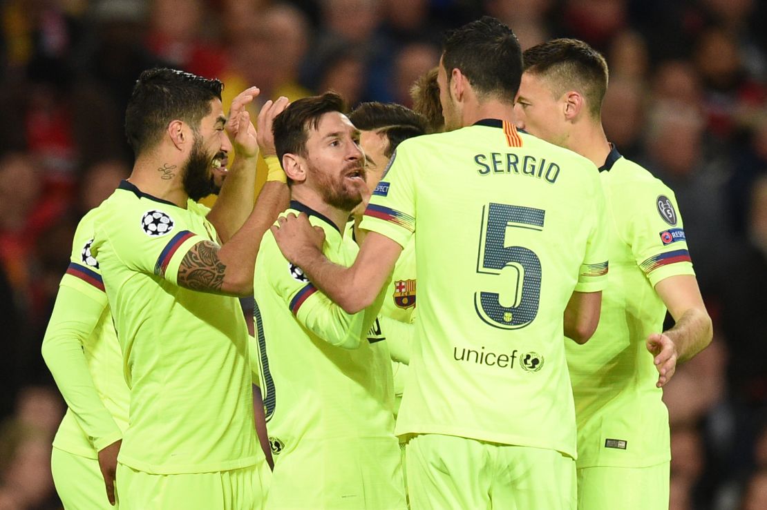 Barcelona players celebrate after scoring against Manchester United.