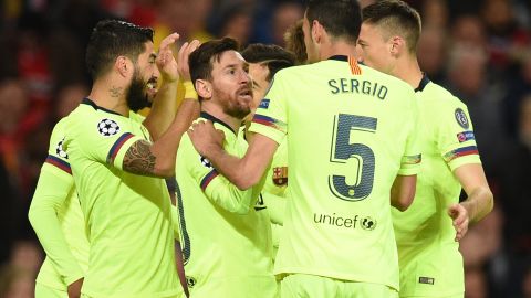 Barcelona players celebrate after scoring against Manchester United.
