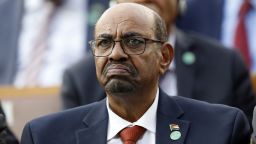 FILE - In this July 9, 2018, file photo, Sudan's President Omar al-Bashir attends a ceremony for Turkey's President Recep Tayyip Erdogan, at the Presidential Palace in Ankara, Turkey. Sudan's President has declared a state of emergency on Friday, Feb. 22, 2019, for a year and disbanded the government amid deadly protests. Al-Bashir — who seized power in a 1989 coup— also said Friday that for now he will not change the constitution to allow himself to seek a third term in office. (AP Photo/Burhan Ozbilici, File)