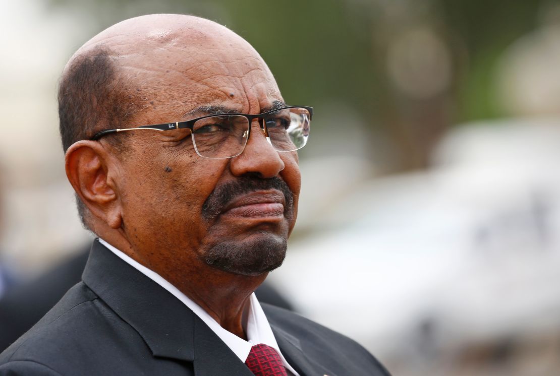 Sudan's President Omar al-Bashir looks on as he receives his Egyptian counterpart at Khartoum International Airport outside the Sudanese capital on October 25, 2018.