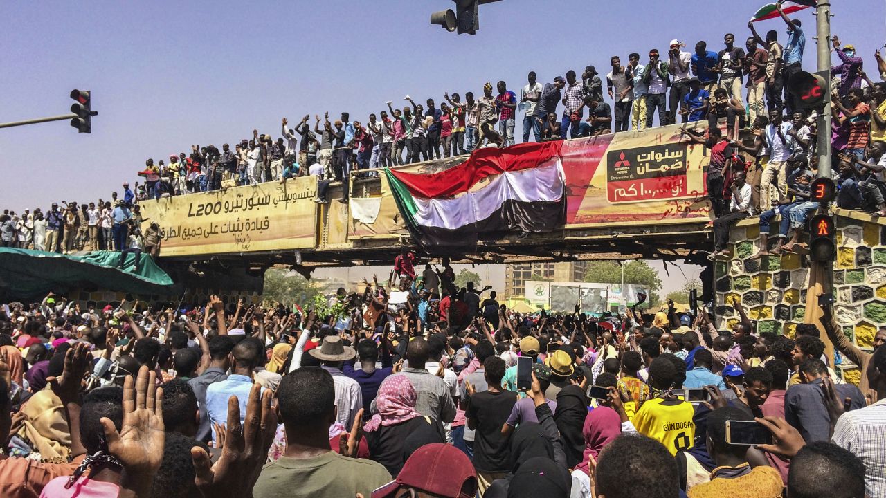 Protesters rally at a demonstration near the military headquarters, Tuesday, April 9, 2019, in the capital Khartoum, Sudan. Activists behind anti-government protests in Sudan say security forces have killed at least seven people, including a military officer, in another attempt to break up the sit-in outside the military headquarters in Khartoum. A spokeswoman for the Sudanese Professionals Association, said clashes erupted again early Tuesday between security forces and protesters who have been camping out in front of the complex in Khartoum since Saturday. (AP Photo)