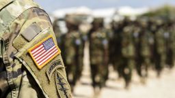 U.S. Army 101st Airborne Division soldiers deployed with U.S. Army Forces Africa stand with Somali National Army soldiers during a graduation ceremony May 24, 2017, in Mogadishu, Somalia. The logistics course focused on various aspects of moving personnel, equipment and supplies. (U.S. Air Force photo by Staff Sgt. Nicholas M. Byers)