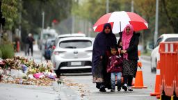 Members of the Muslim community arrive for Friday prayers at al Noor mosque in Christchurch on April 5, 2019. 