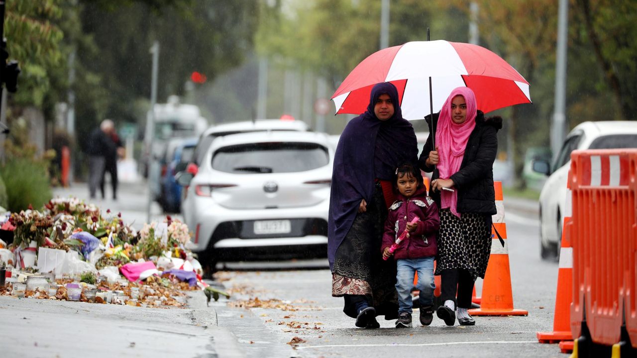 Members of the Muslim community arrive for Friday prayers at Al Noor mosque on April 5, 2019 in Christchurch, New Zealand.