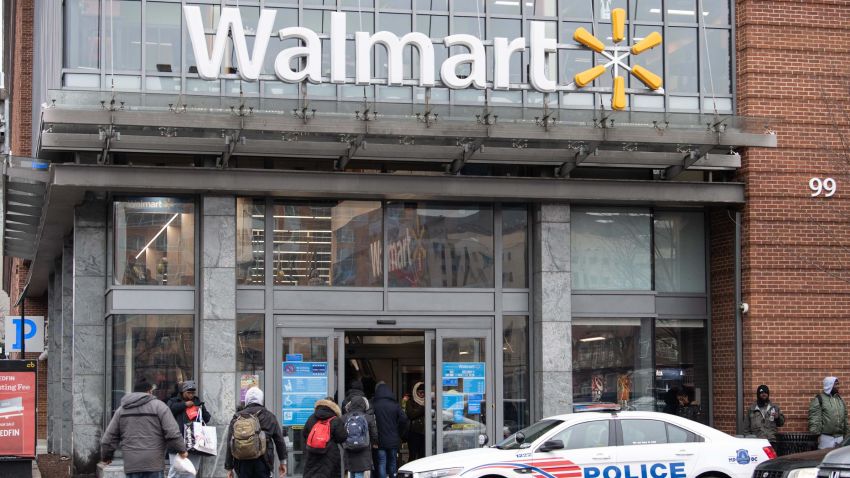 People enter a Walmart store in Washington, DC, on March 1, 2019. - Walmart is in damage-control mode over a plan to phase out store greeters, a shift that closes off an employment niche that had frequently been taken by disabled workers. The retail giant, the biggest employer in the United States, has revamped the position of "People Greeter" into "Customer Host" and added new tasks, such as handling customer refunds, scanning receipts and checking shopping carts. (Photo by NICHOLAS KAMM / AFP)        (Photo credit should read NICHOLAS KAMM/AFP/Getty Images)