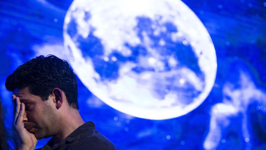 TEL AVIV, ISRAEL - APRIL 11: An Israeli man react after Beresheet spacecraft fails to land safely on the moon on April 11, 2019 in Tel Aviv, Israel. The Israeli spacecraft - called Beresheet, which is a joint project between SpaceIL, a privately funded Israeli non-profit organisation, and Israel Aerospace Industries failed to land on the lunar surface after the apparent failure of its main engine. (Photo by Amir Levy/Getty Images)