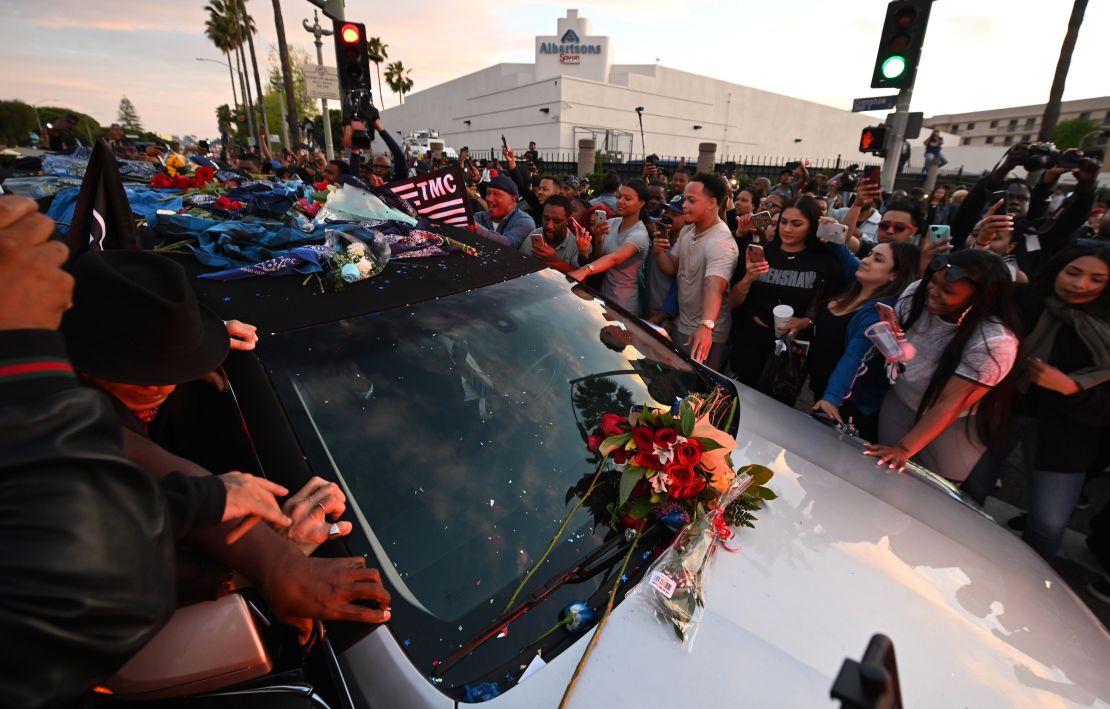 The hearse carrying the remains of rapper Nipsey Hussle arrives at the Angelus Funeral Home. 