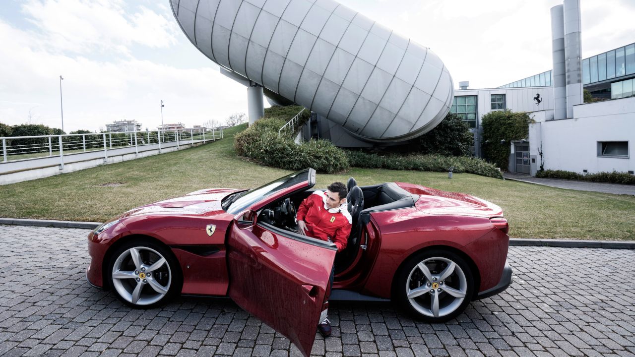 Raffaele de Simone with a Ferrari Portofino at the factory in Maranello, italy.