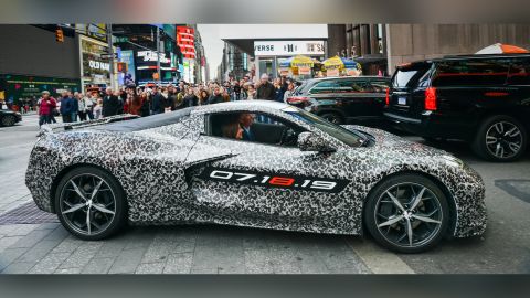 The Corvette's chief engineer Tadge Juechter and General Motors CEO Mary Barra drive in a camouflaged next-generation Corvette near Times Square.