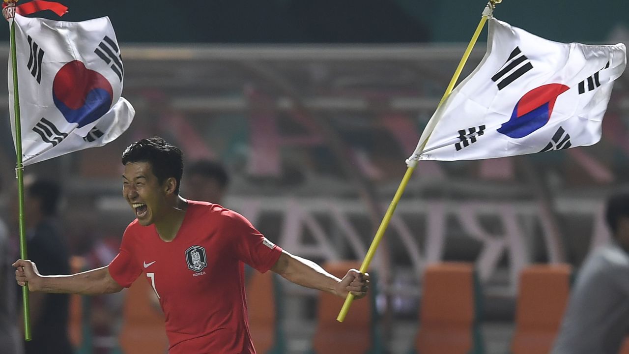South Korea's forward Heung Min Son celebrates after winning gold at the 2018 Asian Games.