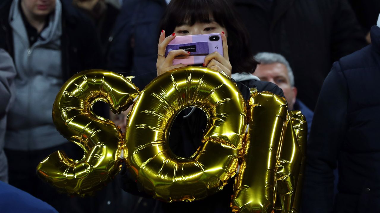  A fan of Son Heung-min of Tottenham Hotspur with a balloon honoring the South Korea star. 