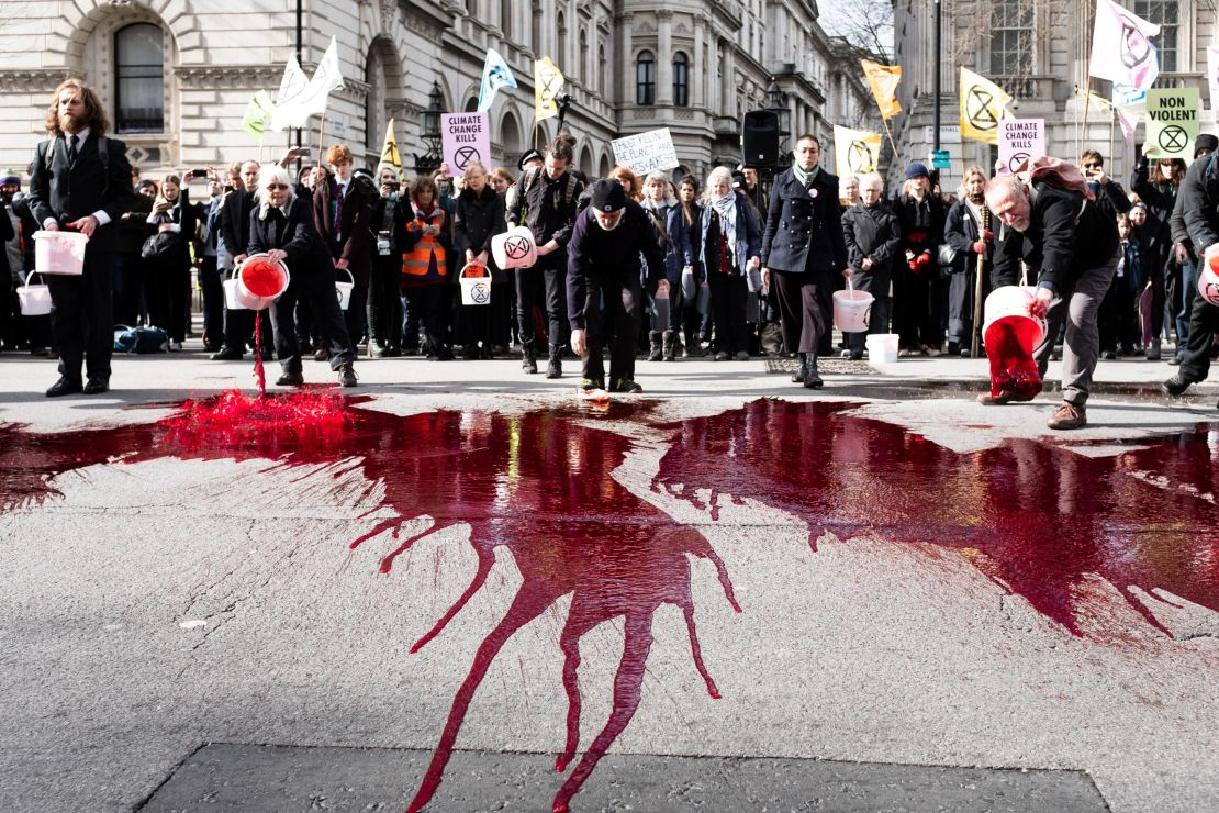 Extinction Rebellion activists threw 200 liters of fake blood outside Downing Street in March 2019. 