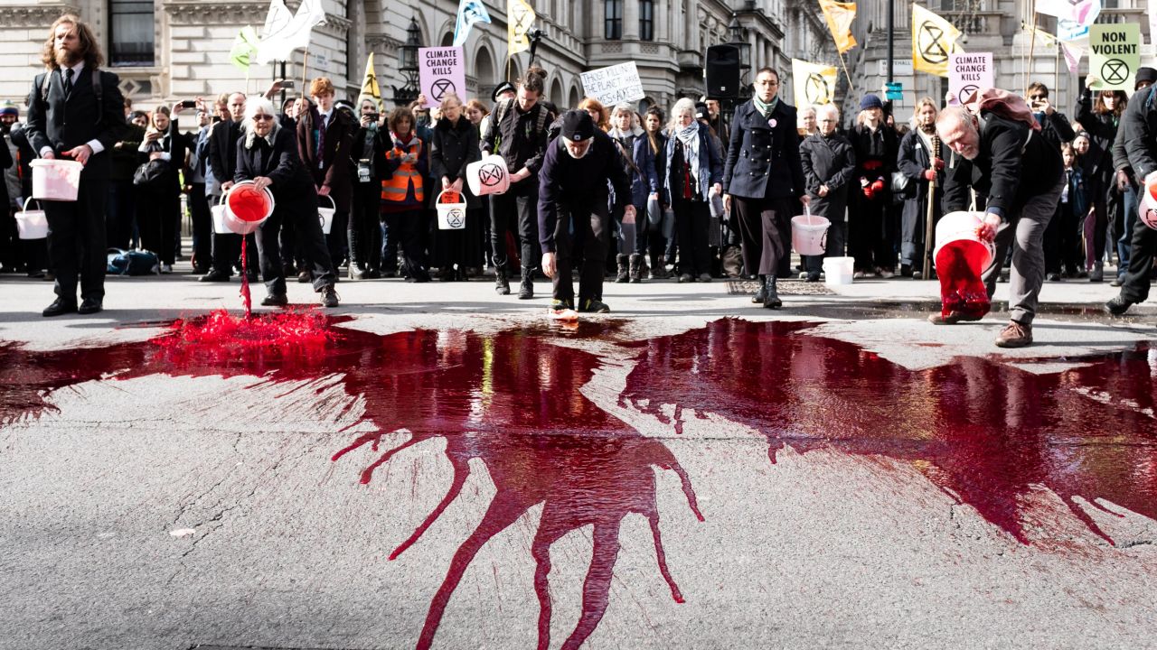 Extinction Rebellion activists threw 200 liters of fake blood outside Downing Street in March 2019.