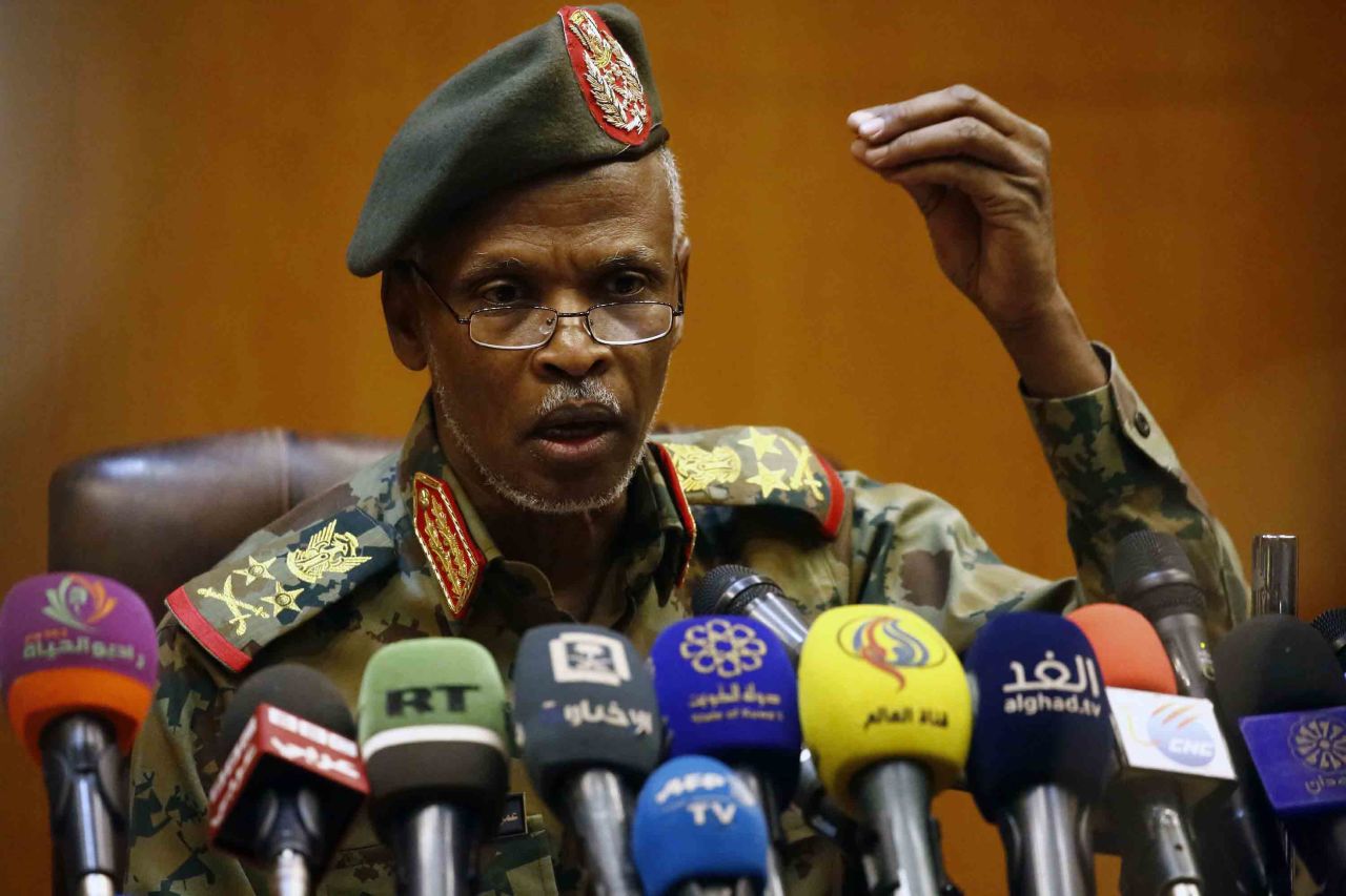 Lt. Gen. Omar Zain al-Abdin, head of the Sudanese military council's political committee, addresses journalists in Khartoum on April 12, one day after Bashir was ousted.