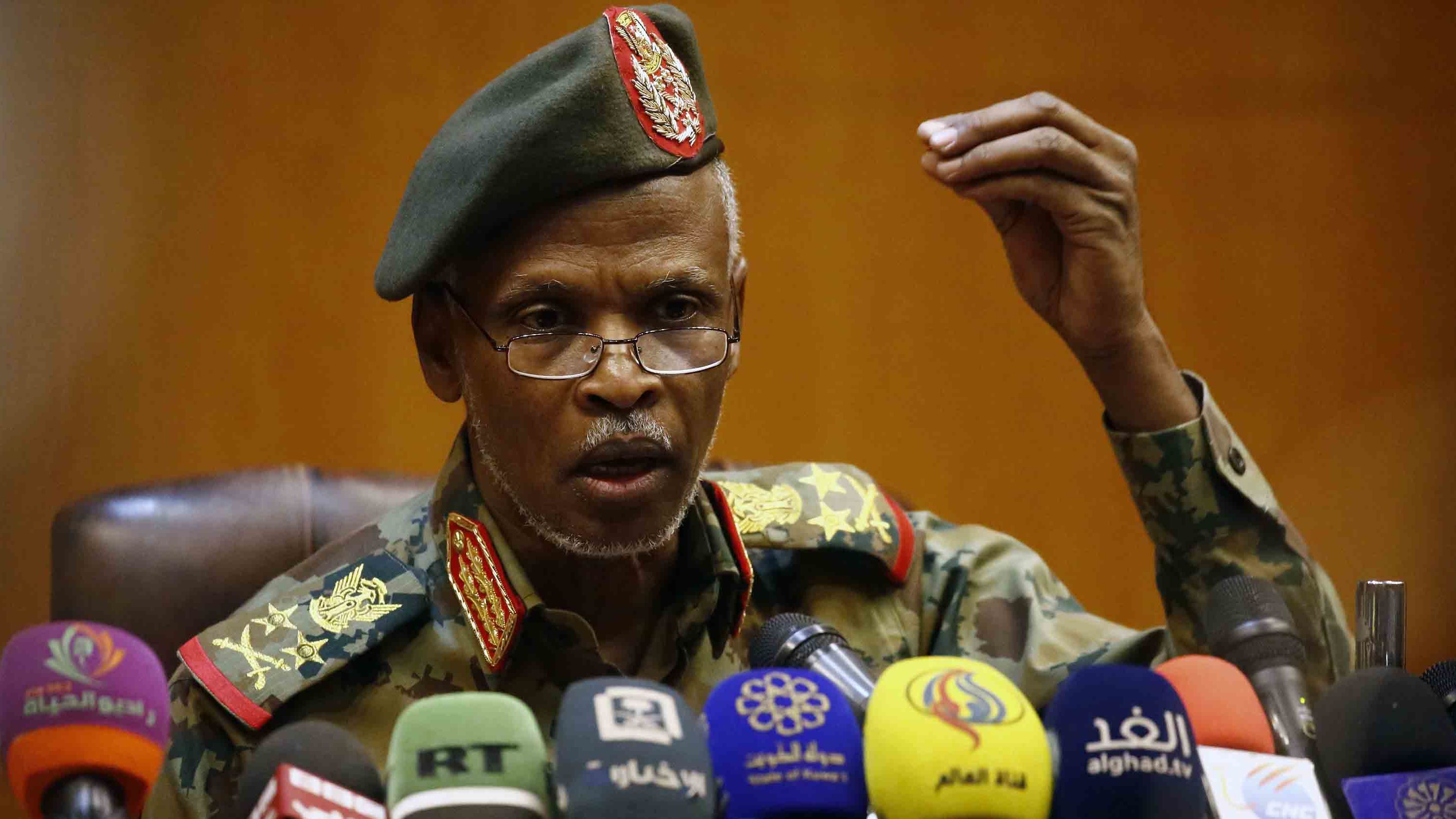 Lt. Gen. Omar Zain al-Abdin, head of the Sudanese military council's political committee, addresses journalists in Khartoum on April 12, one day after Bashir was ousted.
