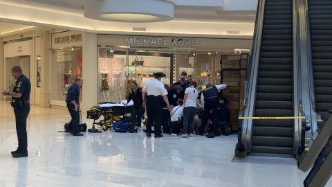 Police and paramedics respond to the scene at the Mall of America on April 12. 