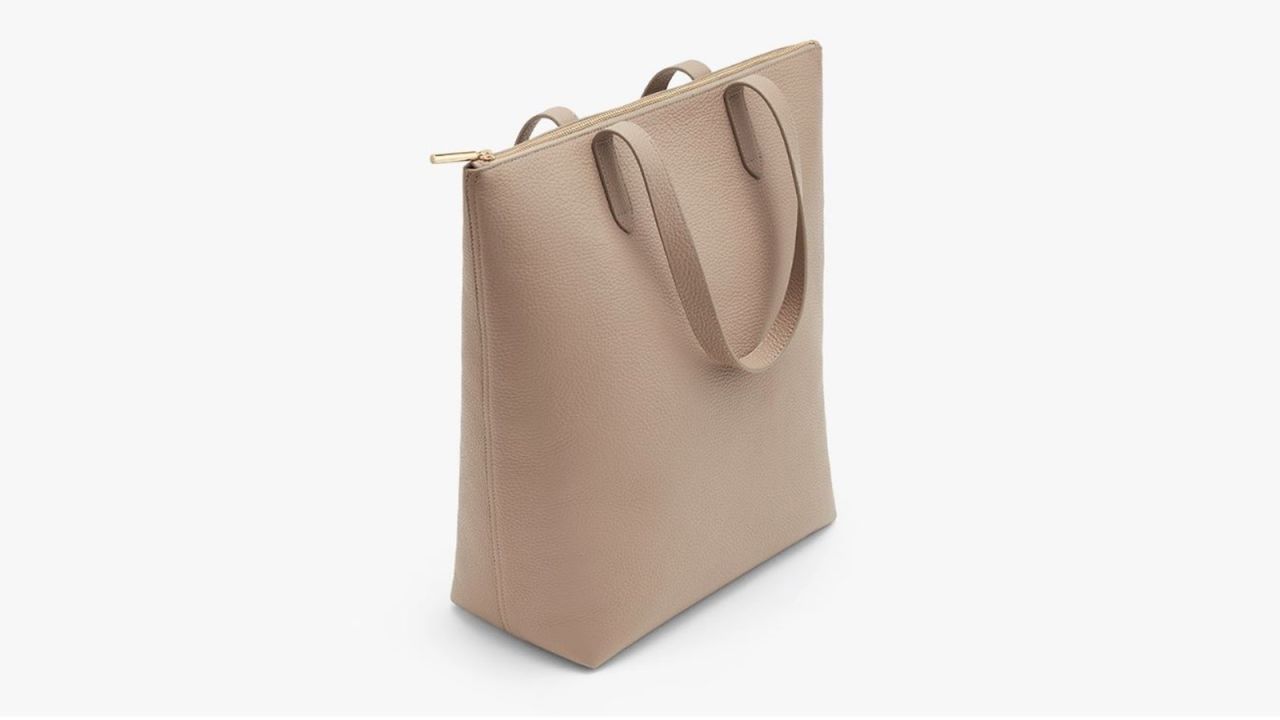 <strong>Cuyana Tall Structured Leather Zipper Tote ($215;</strong><a href="http://redirect.viglink.com?type=bk&opt=false&u=https%3A%2F%2Fwww.cuyana.com%2Ftall-structured-leather-zipper-tote.html%23stone&key=ed7eb6546c416eb284920d7a87c6d8c4" target="_blank" target="_blank"><strong> cuyana.com</strong></a><strong>)</strong><br /><br />If you're looking for a tote but are concerned about keeping your valuables safe and secure, this zipper tote from Cuyana is the one for you. It's made of beautiful Italian pebbled leather and has a built-in laptop sleeve and an internal pocket for your phone and wallet.