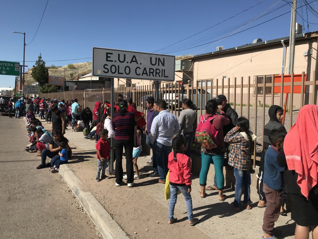 Migrants waited to be fed at a soup kitchen operated by the Kino Border Initiative in Nogales, Sonora. The wait to have an asylum bid heard at the border has soared since January. 