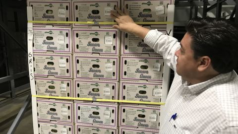 Jaime Chamberlain, co-owner of Chamberlain Distribution Inc., showed boxes of Mexican gray squash on the US side of the border. Unpredictable border policy is making it difficult to plan.