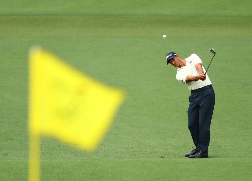 Australian Adam Scott, the 2013 champion, pushed the lead to eight under before dropping back into the pack at seven under.