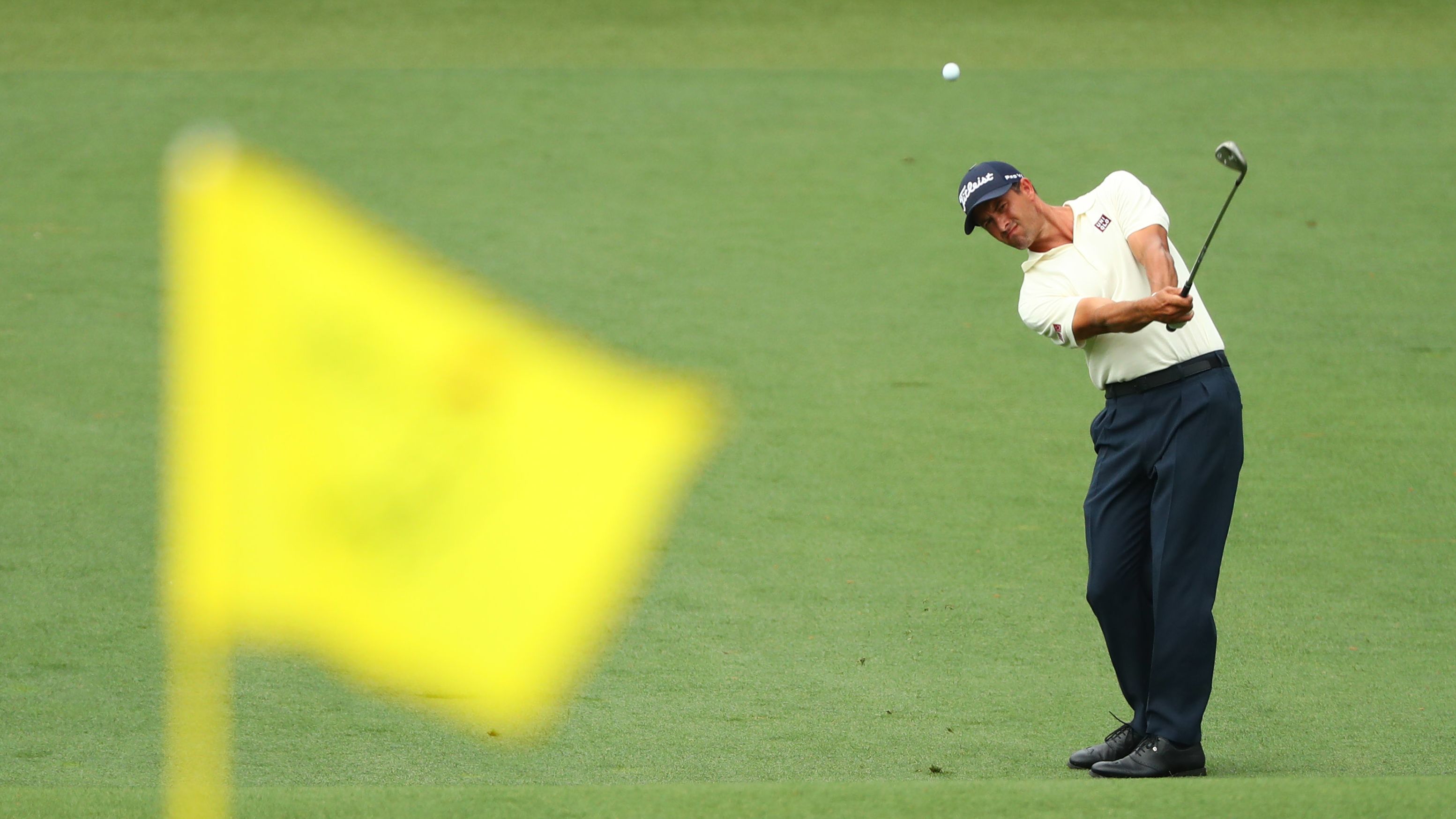 Australian Adam Scott, the 2013 champion, pushed the lead to eight under before dropping back into the pack at seven under.