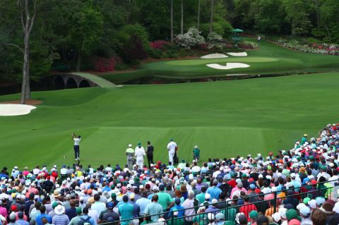 Woods hit a stunning tee shot to 12 before the siren went to suspend play because of thunderstorms. 