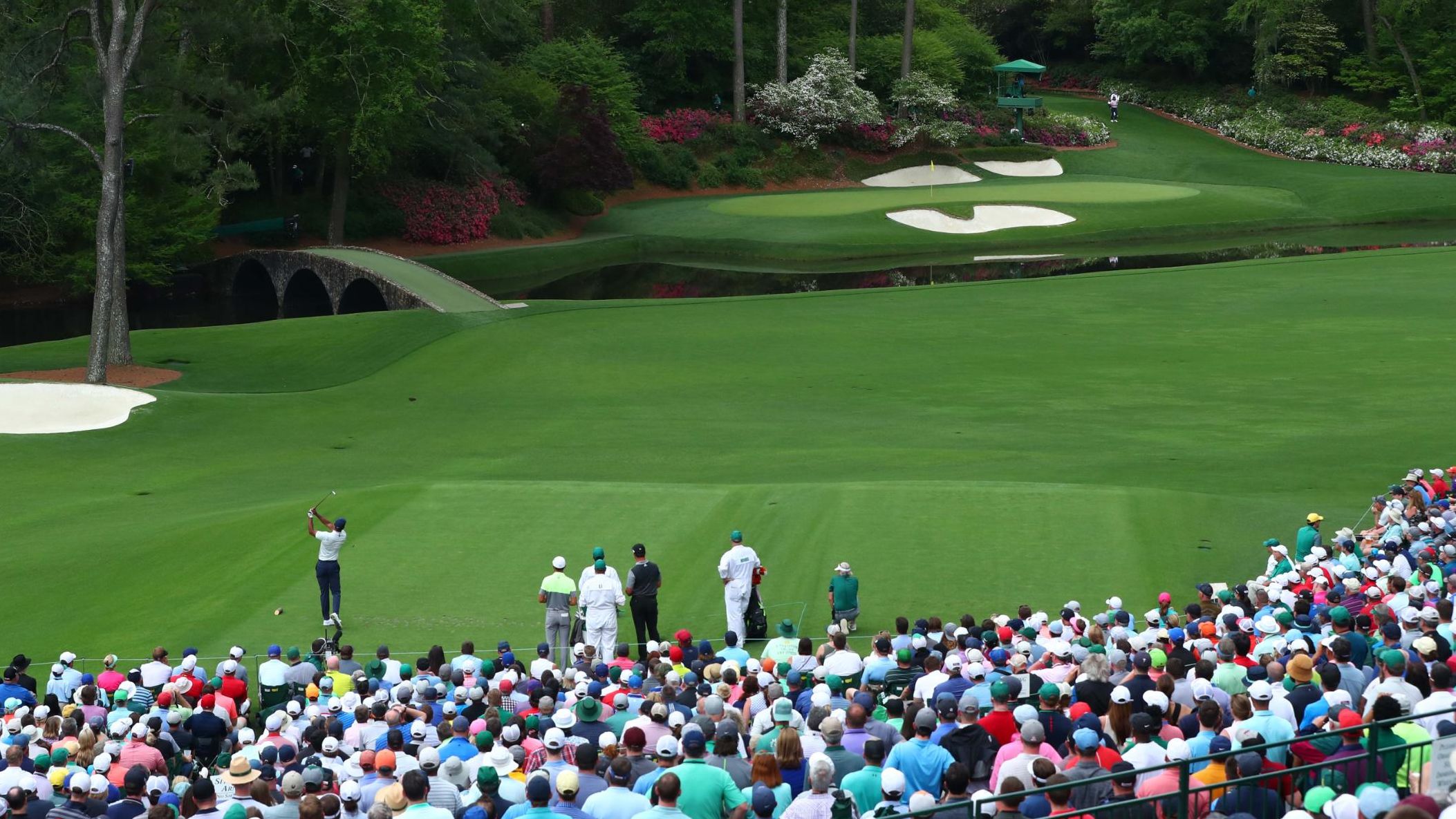 Woods hit a stunning tee shot to 12 before the siren went to suspend play because of thunderstorms. 