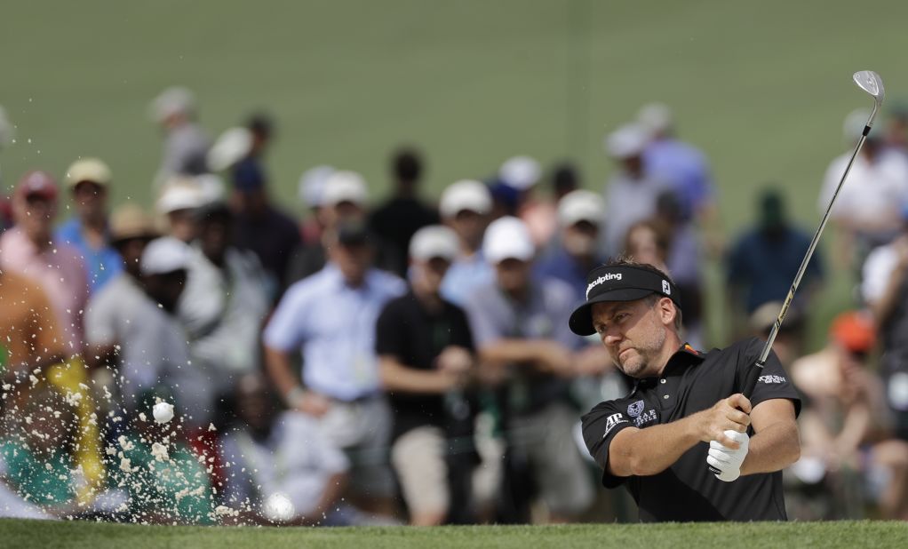 England's Ian Poulter kept up his challenge for a maiden major title with another good round at Augusta.