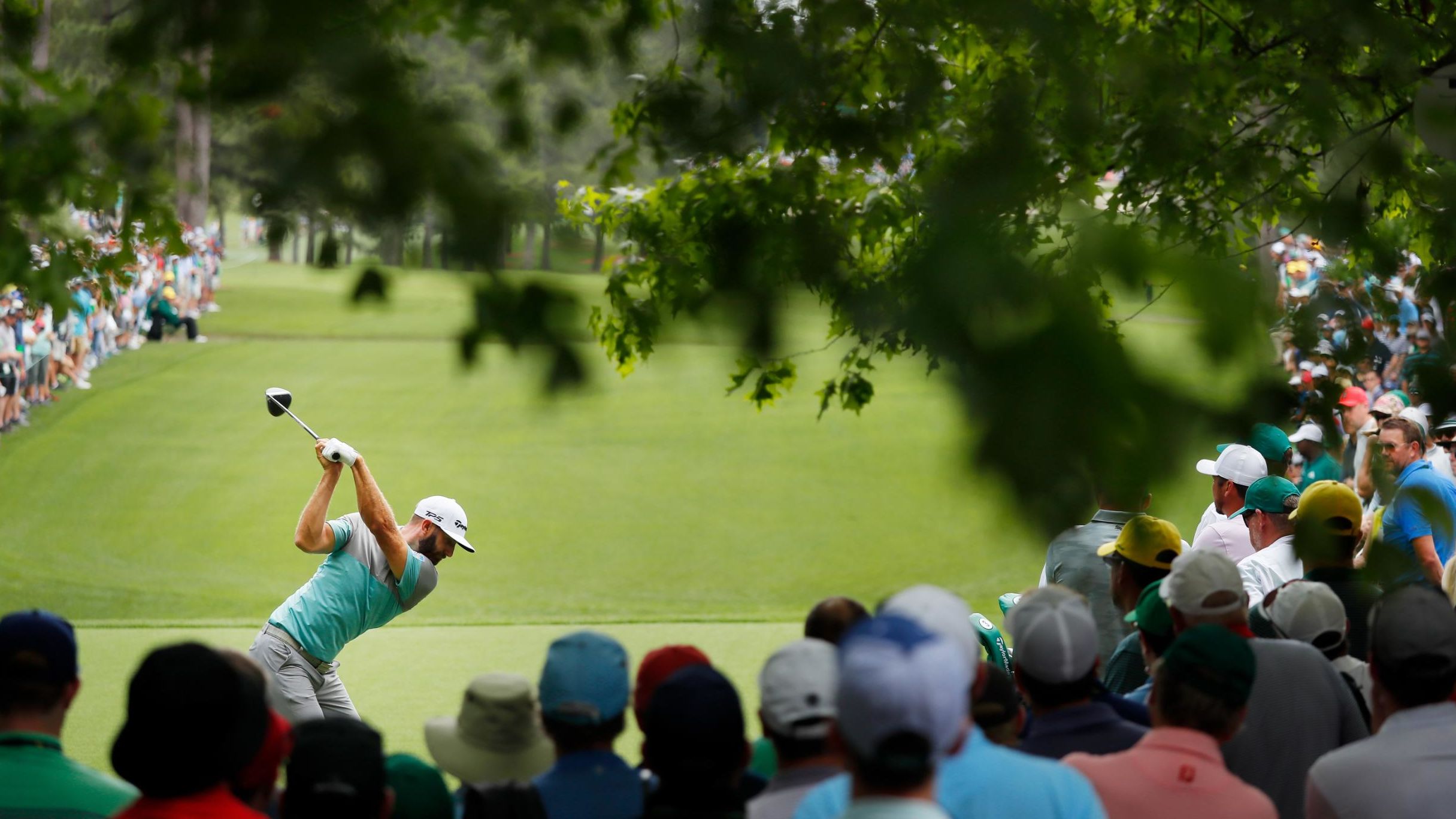 World No.2 Dustin Johnson was in a group on six under alongside Woods at the halfway stage.
