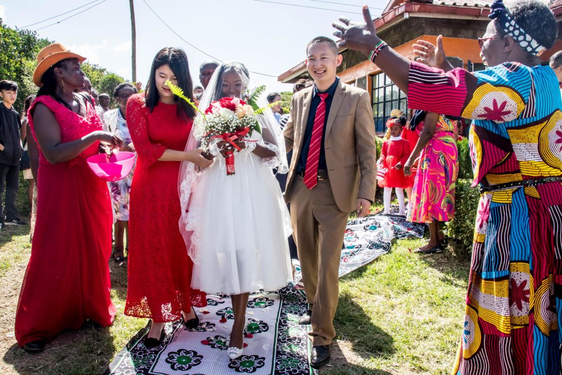Liang Yongyu and Karen Ngunjiri were married near Mount Kenya after he converted to Christianity for her.
