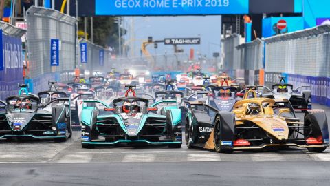 Drivers enter the first turn at the start of the Rome E-Prix.