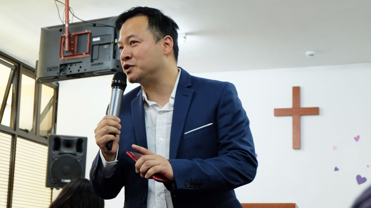 Jonathon Chow, 43, a senior pastor  at the Bread of Life Church, delivers a sermon to the Nairobi congregation during a visit from Taiwan, where he is based and the church is headquartered. 
