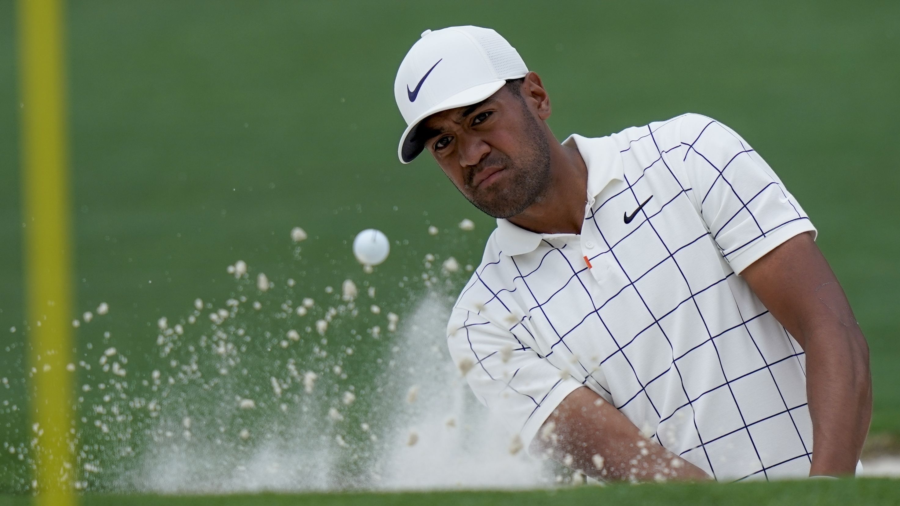 American Tony Finau sat alongside Woods. Finau dislocated his ankle in the par-3 contest ahead of his debut in last year's Masters.  