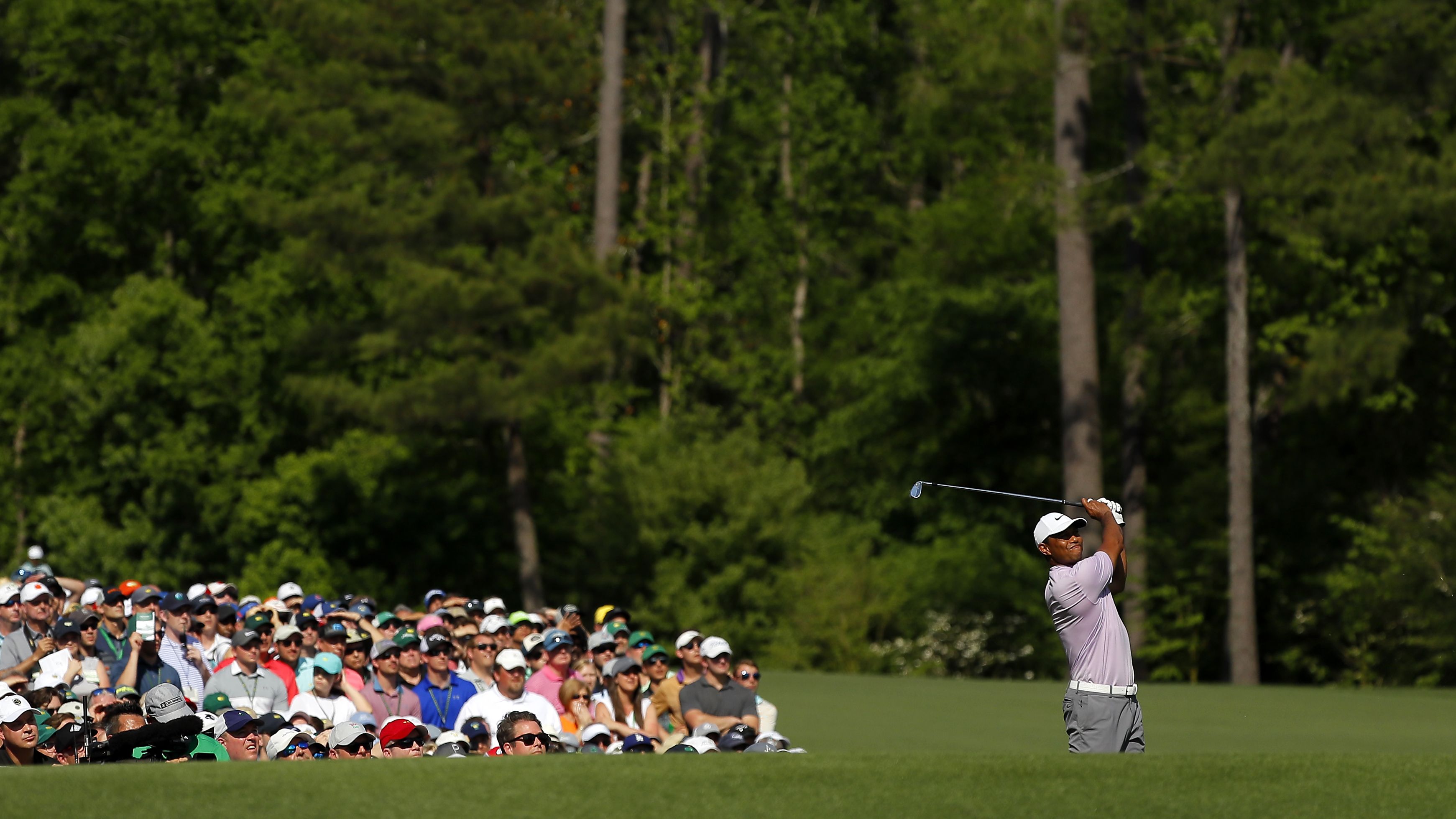 Woods was two shots back and within touching distance of a fifth Green Jacket and 15th major title. 