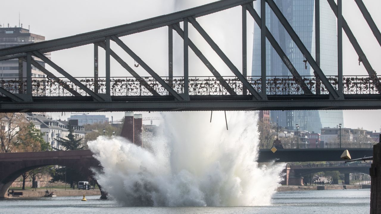 Water shoots out of the Main River as the bomb is detonated.