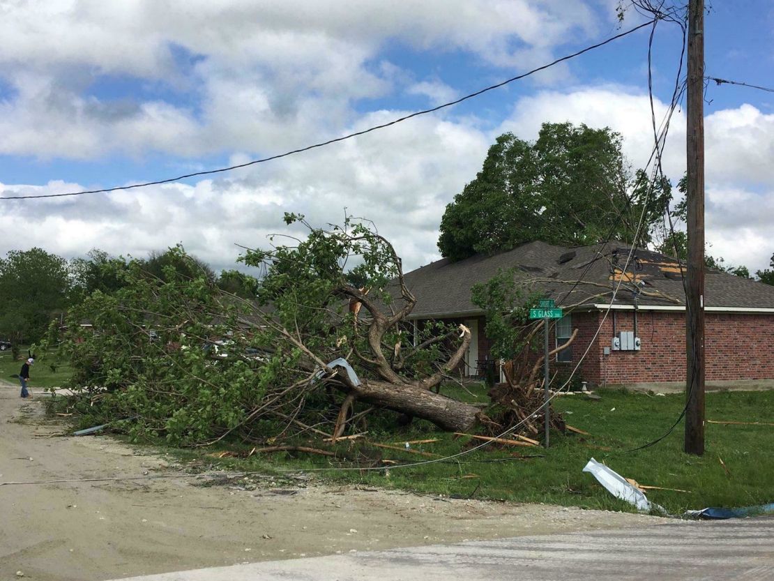 A storm that struck Franklin, Texas, yanked trees out of the ground.
