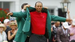 AUGUSTA, GEORGIA - APRIL 14: Tiger Woods (R) of the United States is awarded the Green Jacket by Masters champion Patrick Reed (L) during the Green Jacket Ceremony after winning the Masters at Augusta National Golf Club on April 14, 2019 in Augusta, Georgia. (Photo by Kevin C. Cox/Getty Images)