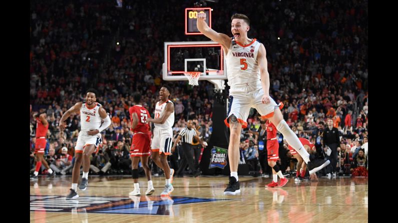 Virginia Cavaliers guard Kyle Guy (5) celebrates after winning the National Championship game at U.S. Bank Stadium. Virginia defeated Texas Tech 85-77 in overtime. 