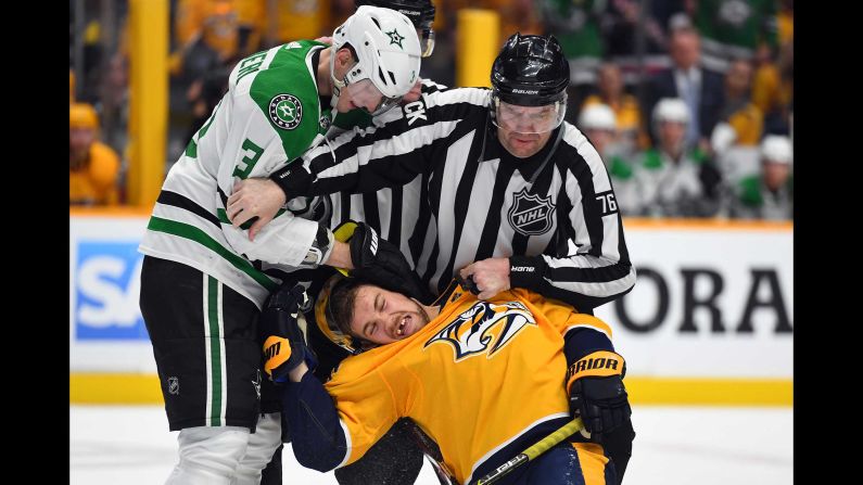 Dallas Stars defenseman John Klingberg pulls on the head of Nashville Predators right wing Viktor Arvidsson after the whistle in game one of the first round of the 2019 Stanley Cup Playoffs at Bridgestone Arena in Nashville on April 10.