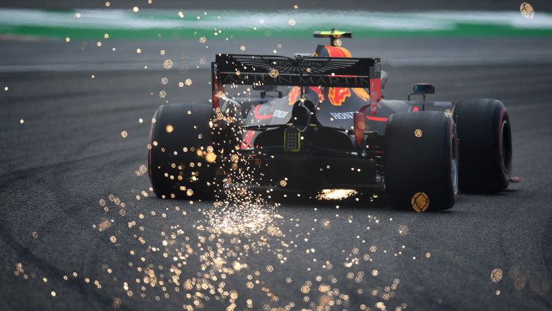 Sparks fly behind Pierre Gasly of France driving the Aston Martin Red Bull Racing RB15 on track during practice for the F1 Grand Prix of China at Shanghai International Circuit on April 12 in Shanghai, China. 