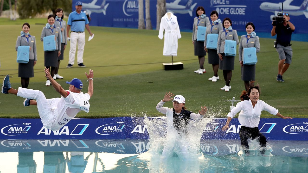 How to watch the Chevron Championship live: Start time, channel and other things to know 4 Ko Jin-young, her caddie David Brooker and her agent Choi Soo-jin leap into Poppie's Pond after her win in 2019.