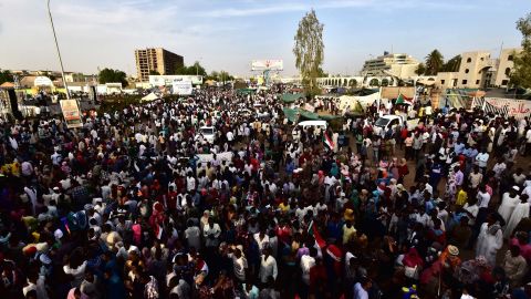 Sudanese demonstrators gather near the military headquarters in the capital Khartoum on April 14, 2019.