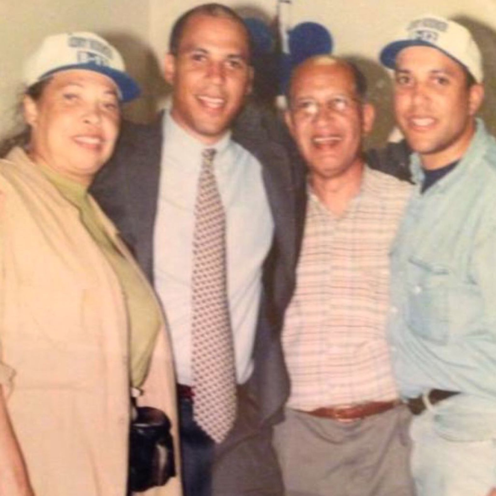 Booker, second from left, poses with his parents and his brother after he was elected to the Municipal Council of Newark in 1998. It was his first public office.