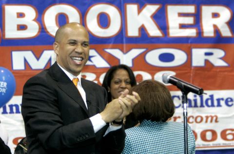 Booker celebrates in May 2006 after he was elected as Newark's mayor. He defeated Deputy Mayor Ronald Rice after incumbent Sharpe James decided to focus on the state Senate.
