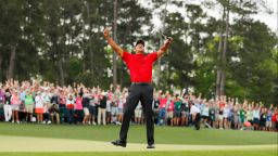 AUGUSTA, GEORGIA - APRIL 14: (Sequence frame 8 of 12) Tiger Woods of the United States celebrates after making his putt on the 18th green to win the Masters at Augusta National Golf Club on April 14, 2019 in Augusta, Georgia. (Photo by Kevin C. Cox/Getty Images)