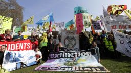Demonstrators gather during a climate protest in Parliament Square in London, Monday, April 15, 2019. Extinction Rebellion have organised a nationwide week of action, they are calling for a full-scale Rebellion to demand decisive action from governments on climate change and ecological collapse. They plan to engage in acts of non-violent civil disobedience against governments in capital cities around the world. (AP Photo/Kirsty Wigglesworth)